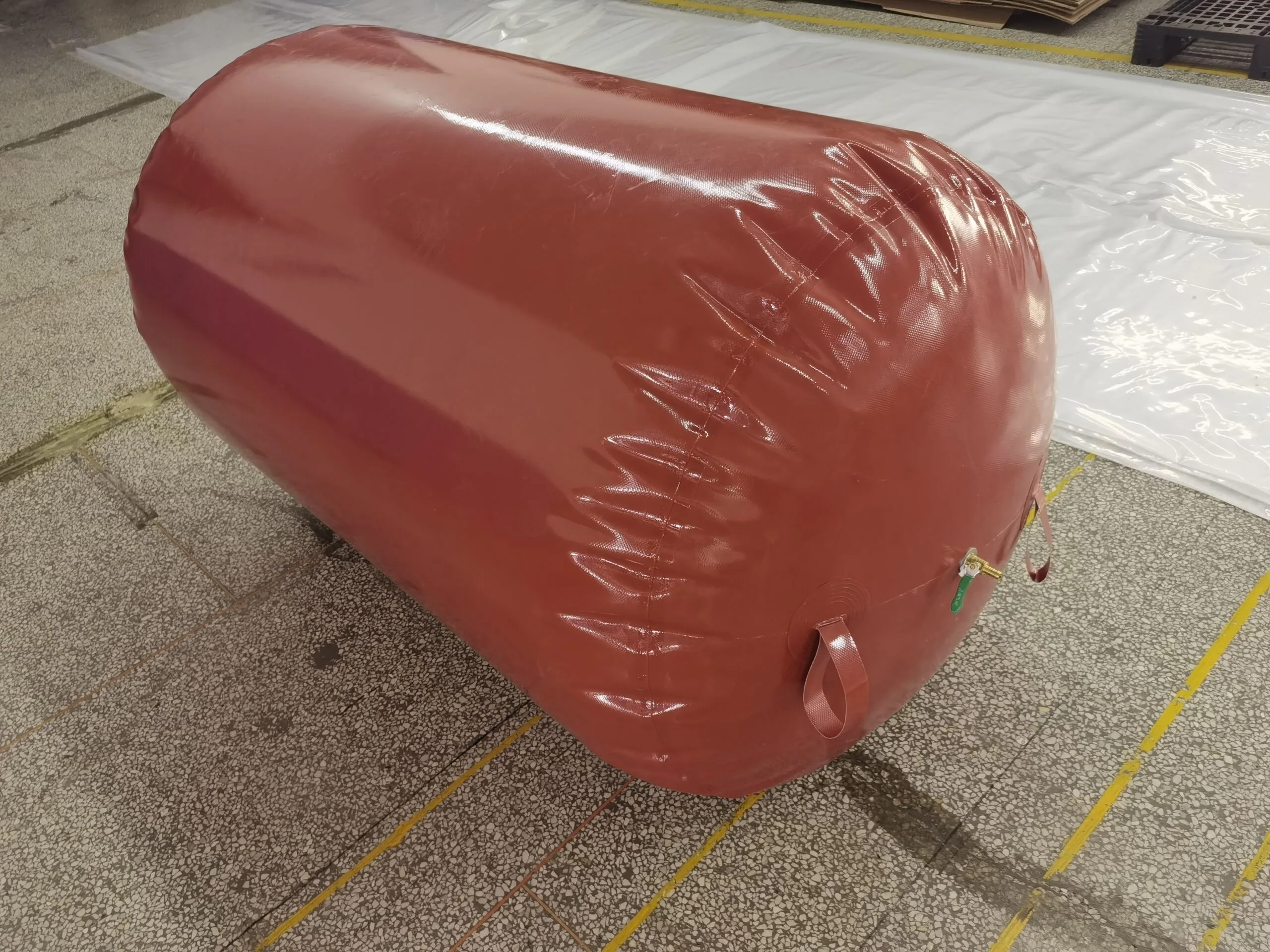 Cylindrical PVC biogas storage bag used as a low-pressure gas holder