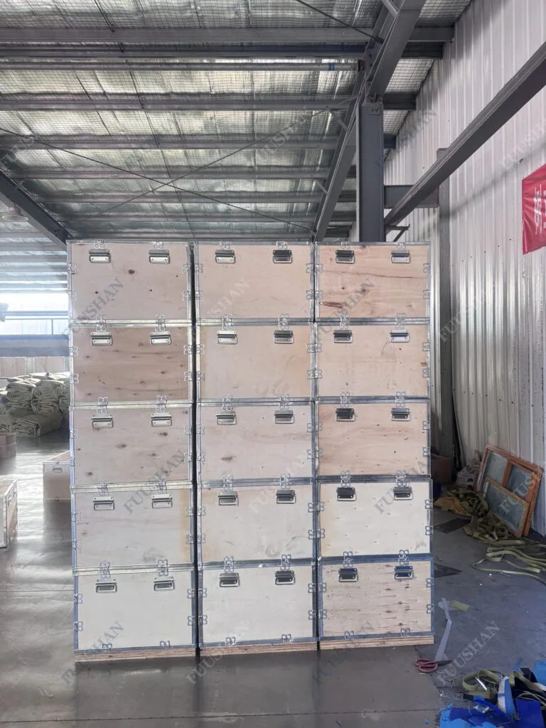 170 pillow water bladders stacked in wooden export crates ready for shipment to a Middle East livestock farm