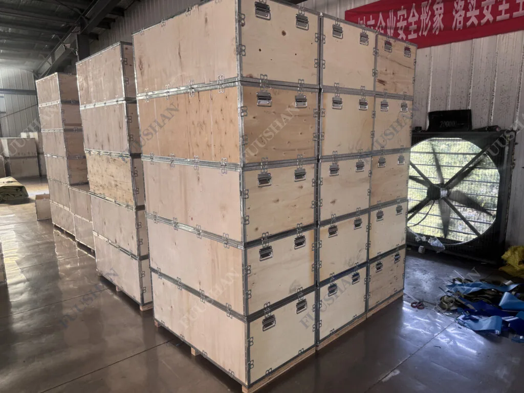 Flexible water bladders packed in wooden crates in the FUUSHAN warehouse before export