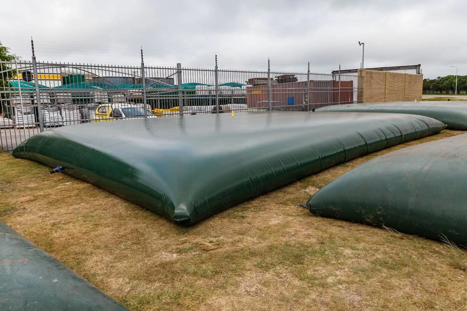 Large flexible water bladder tanks installed outdoors