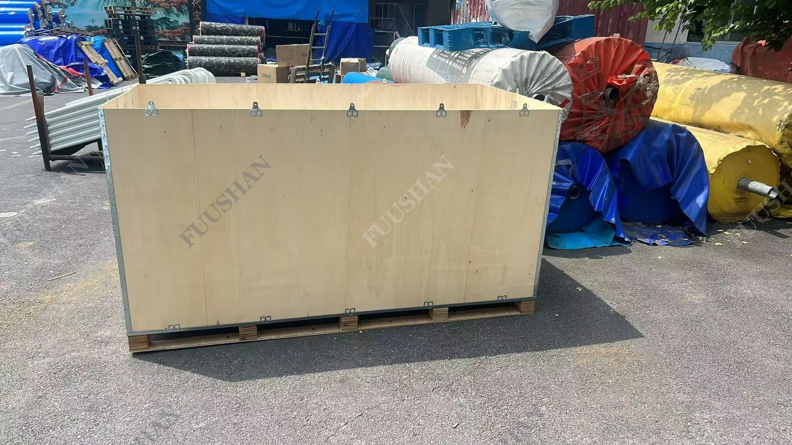 Empty plywood export crate on a pallet